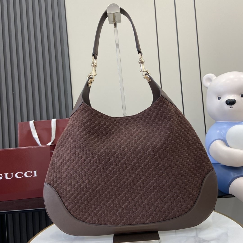 G*u*i top handle bags